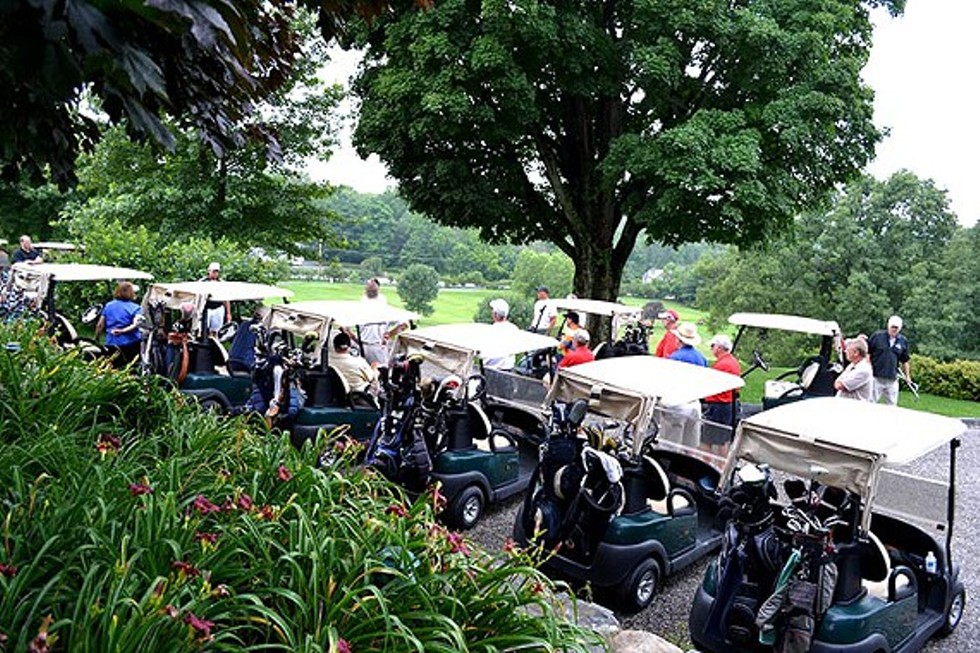 Millbrook Golf & Tennis Club. Golf carts lined up and ready to go.
