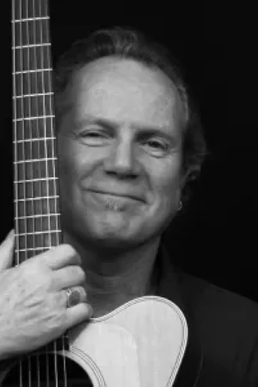 bbf1c6de_brian_-_bw_w-guitar-hv_music.webp