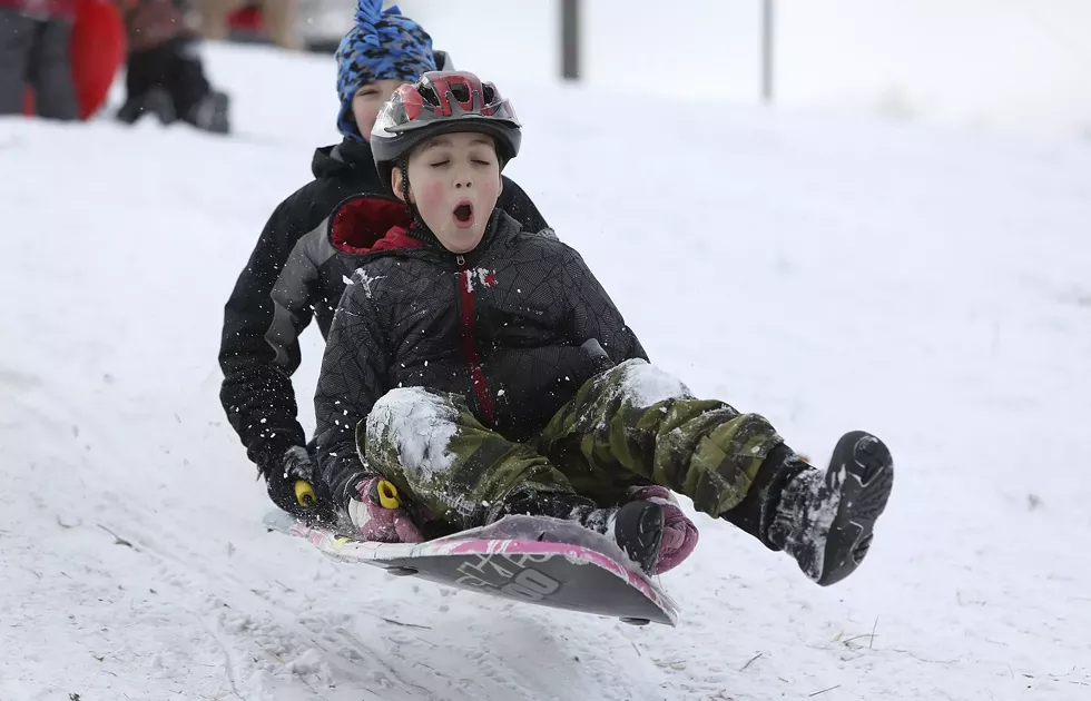 a7d2a334_sledding-min.webp