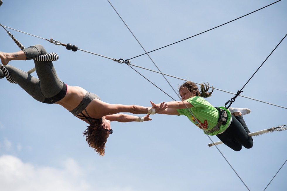 flying_trapeze_knee_hang_catch.jpeg