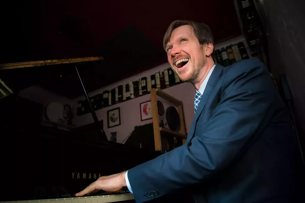 gordon_webster_piano_laughing.webp