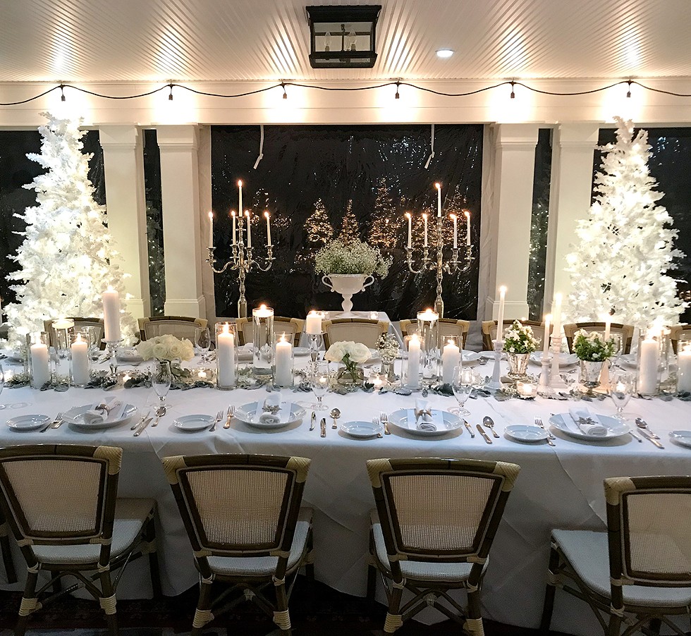 The communal dining table for the 2019 Winter White Party at the Stagecoach Inn.