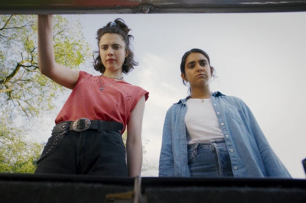 Margaret Qualley as "Jamie" and Geraldine Viswanathan as "Marian" in director Ethan Coen's DRIVE-AWAY DOLLS, a Focus Features release.