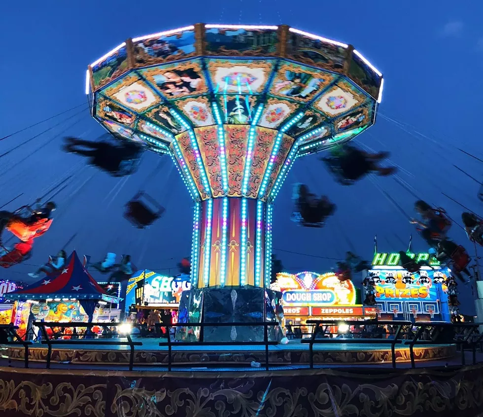 The carnival midway features rides for all ages.