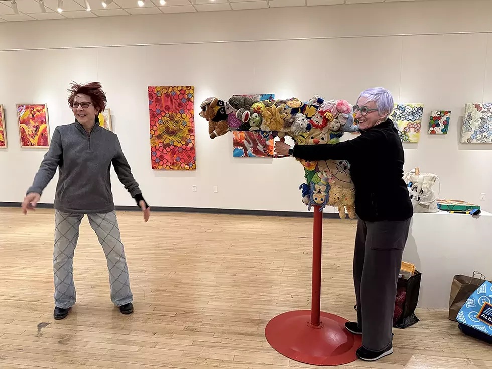 Artists Suprina and Paola Bari with Suprina's sculpture Bang Bang Photo  Op at the Cornell Creative Arts Center.