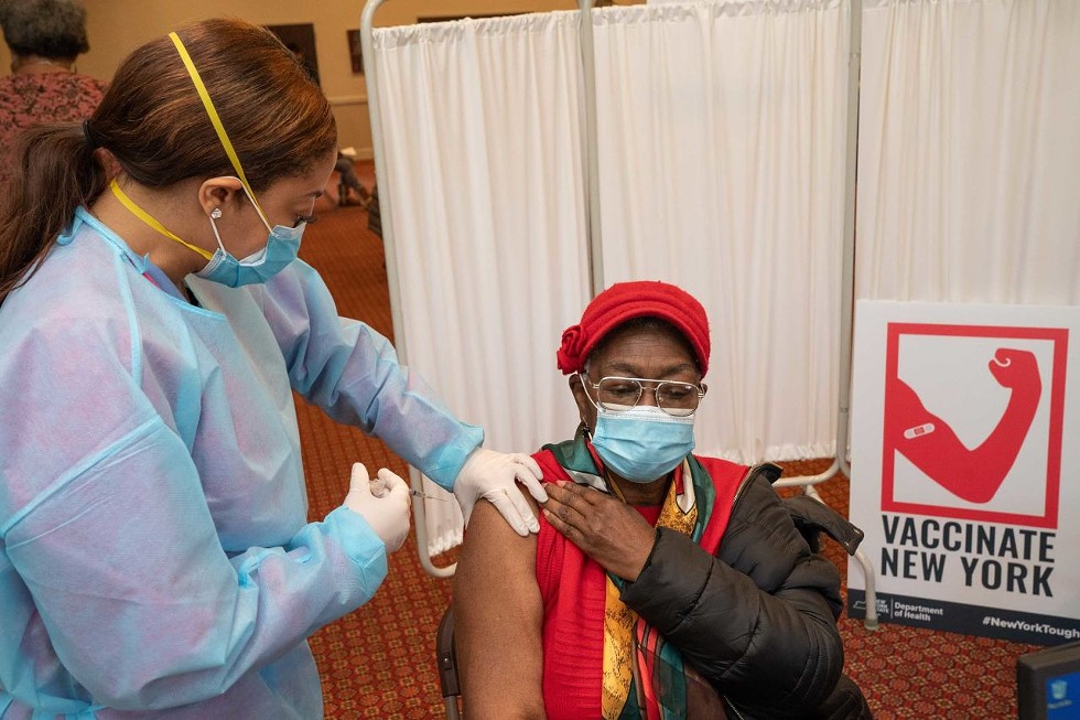 A New Yorker receiving the COVID-19 vaccine at a state popup vaccination site in Mount Vernon.
