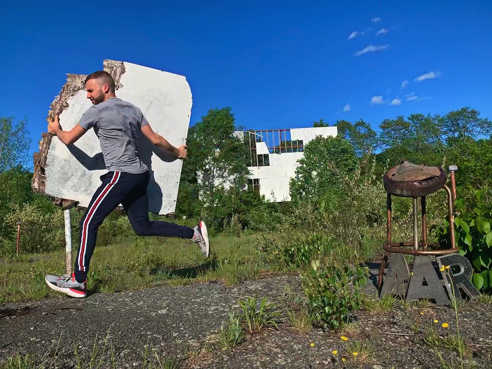 Blake Pfeil at the site of an abandoned drive-in theater in Sullivan County