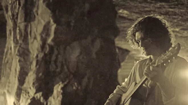 Image: Guitar Grand Champion plays Mining Songs in Historic Cement Mine