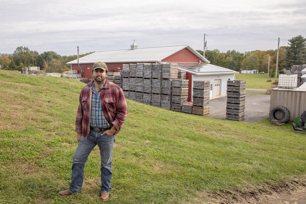Mead Orchards Manager Joe Nuciforo next to the barn that now houses solar modules.