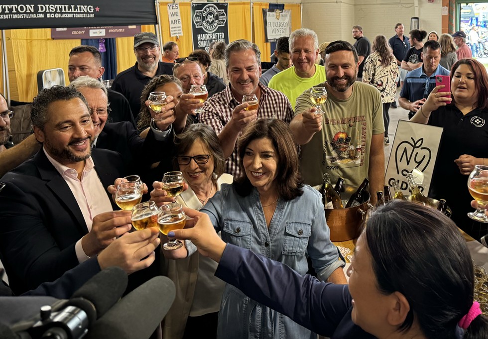 Members of the cider, distilling, and agricultural industries toast at the recent Dutchess County Fair.