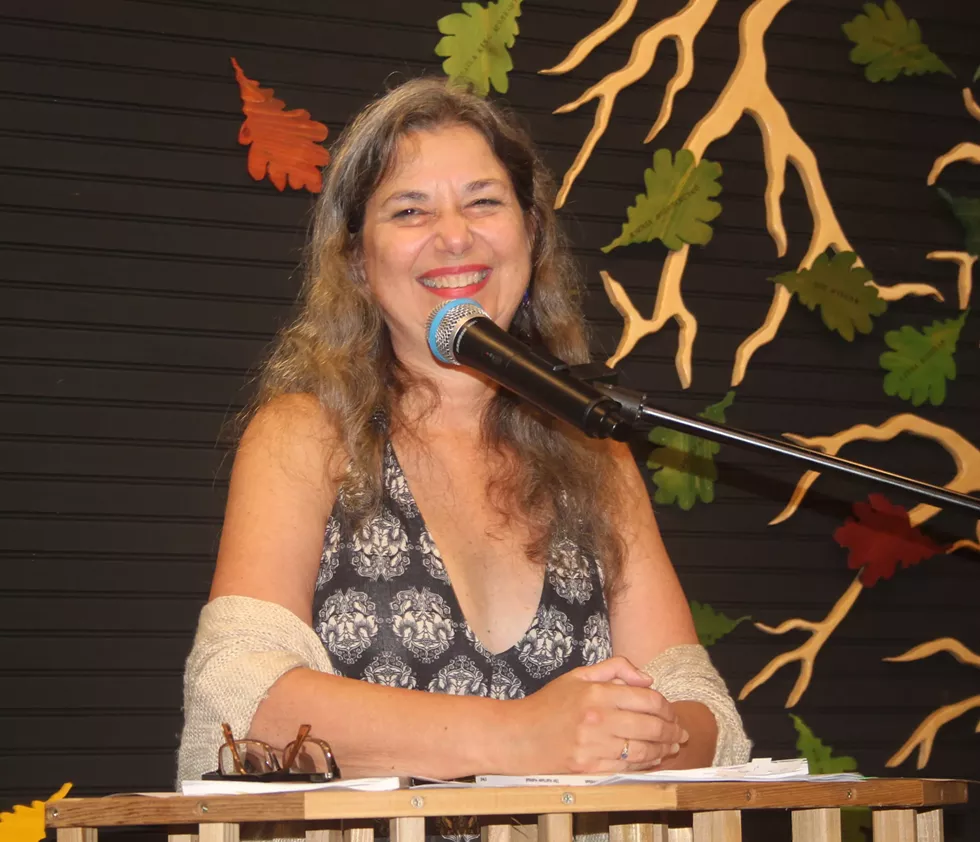 linda_at_poetry_barn_reading_small.webp
