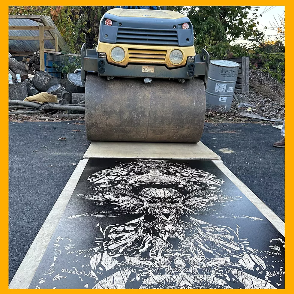 Anette Millington&rsquo;s artwork Flora Guardian getting printed by steamroller during Roll Out&rsquo;s 2023 event.