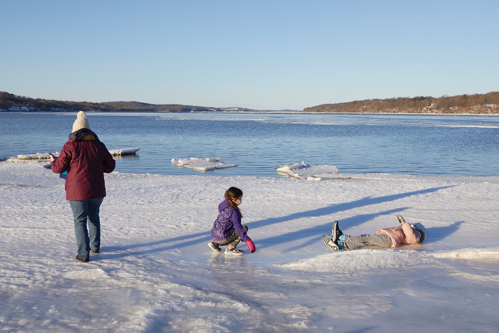 Frolicking on Hudson River ice in early February near the Saugerties Lighthouse.