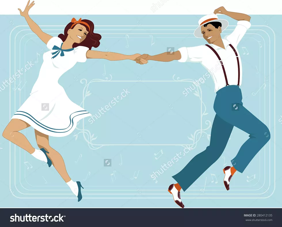 couple_dancing_-forties_attire.webp