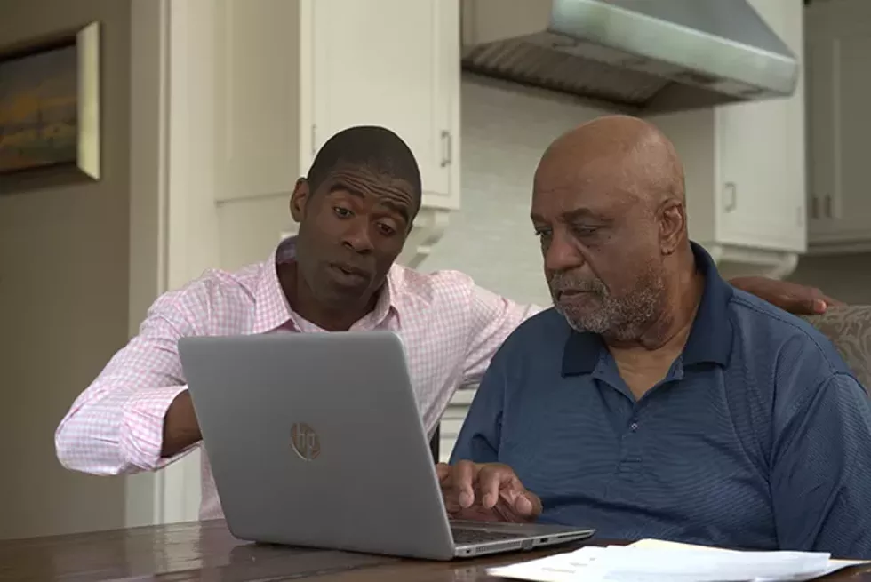 father_and_son_on_computer_together_for_kentico.webp